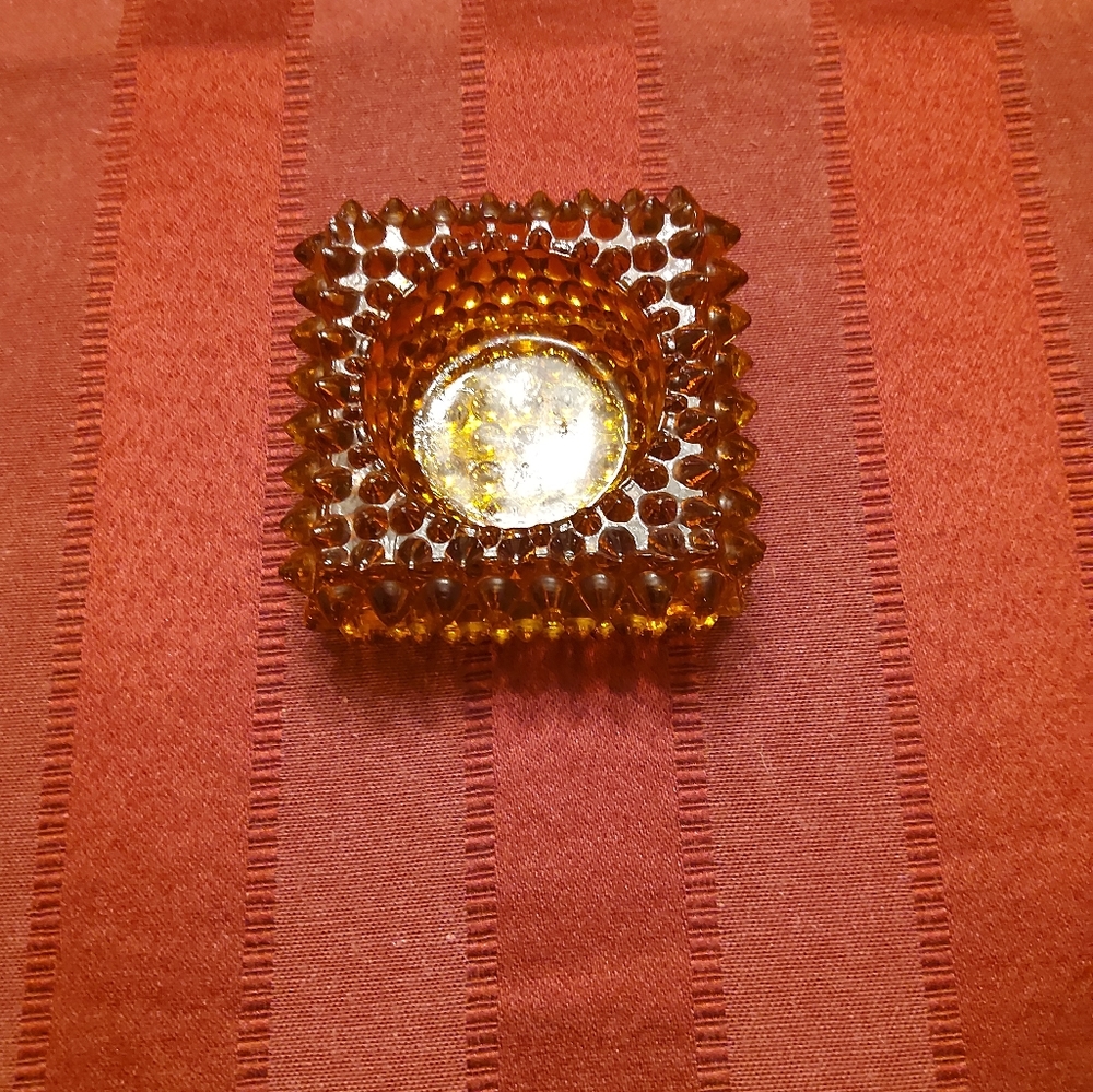 A beautiful Amber Table candle holder